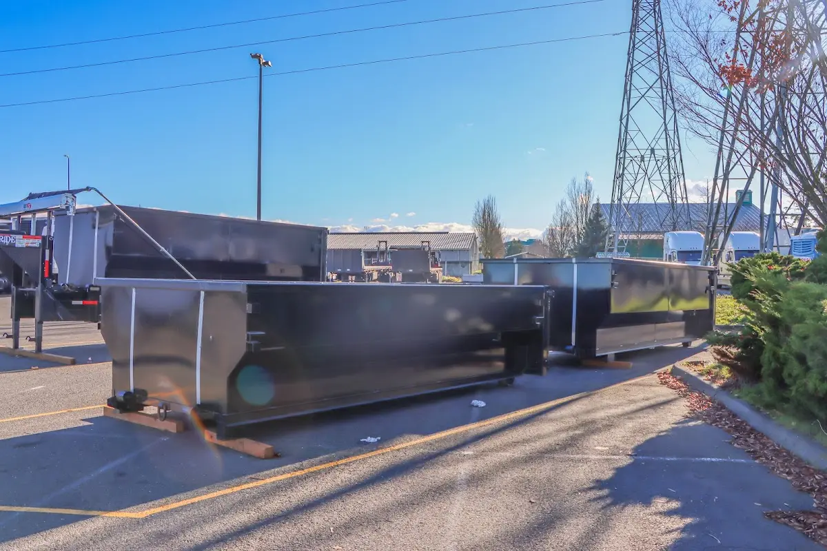 Roll-off dumpster ready for waste disposal at job site for Concrete Dumpster Rental in Flowery Branch